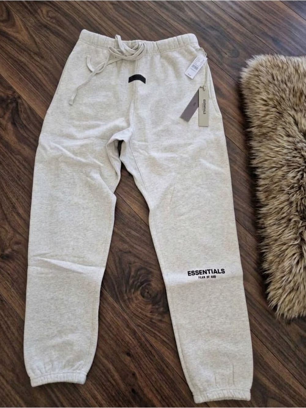 Essentials Men's Heather Light oatmeal Sweatpants with Logo